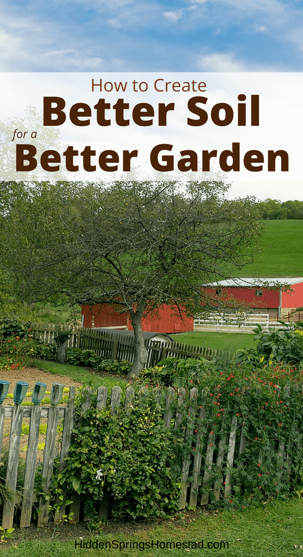 A picket fence with a healthy soil garden