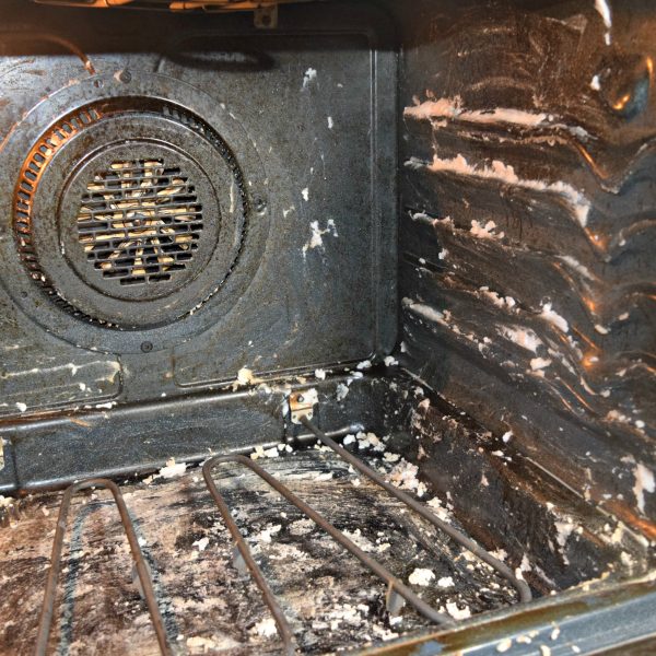 Baking Soda paste on messy oven wall. How to naturally clean your oven with baking soda and vinegar. Hidden Springs Homestead