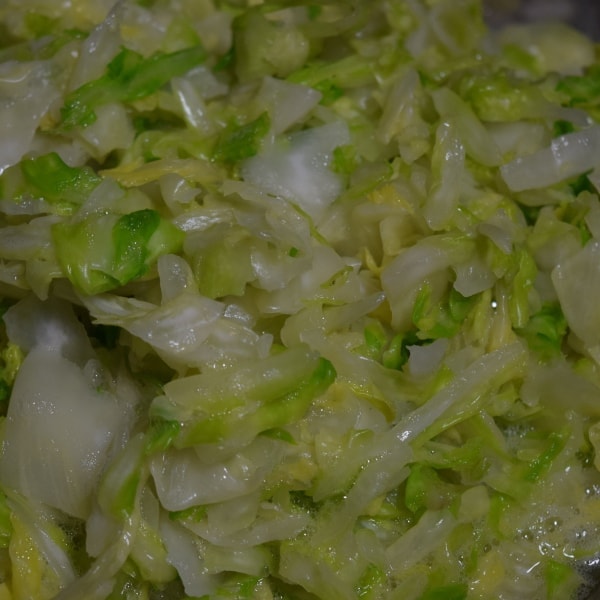 fresh cabbage mashed and limp with juices ready for making sauerkraut Hidden Springs Homestead