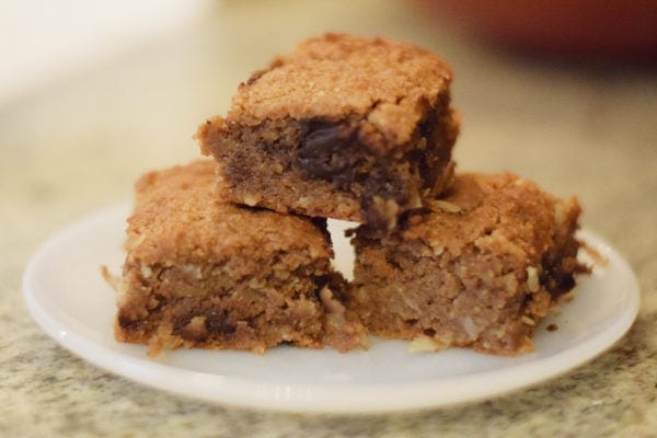 homemade brownies on a white saucer