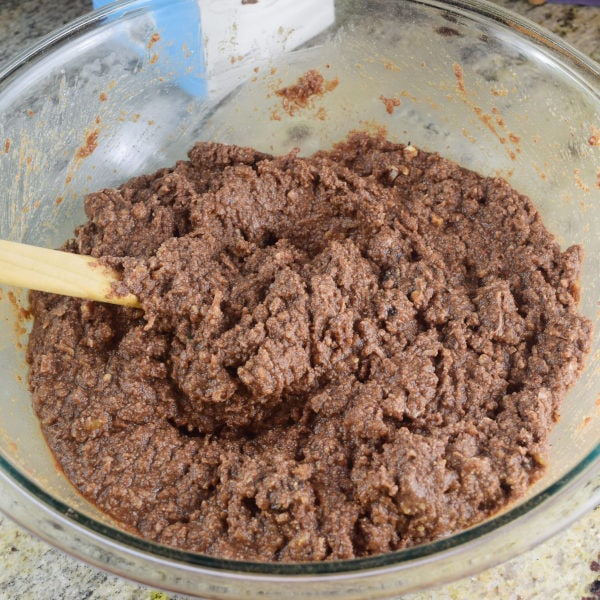 making brownie mix in a bowl