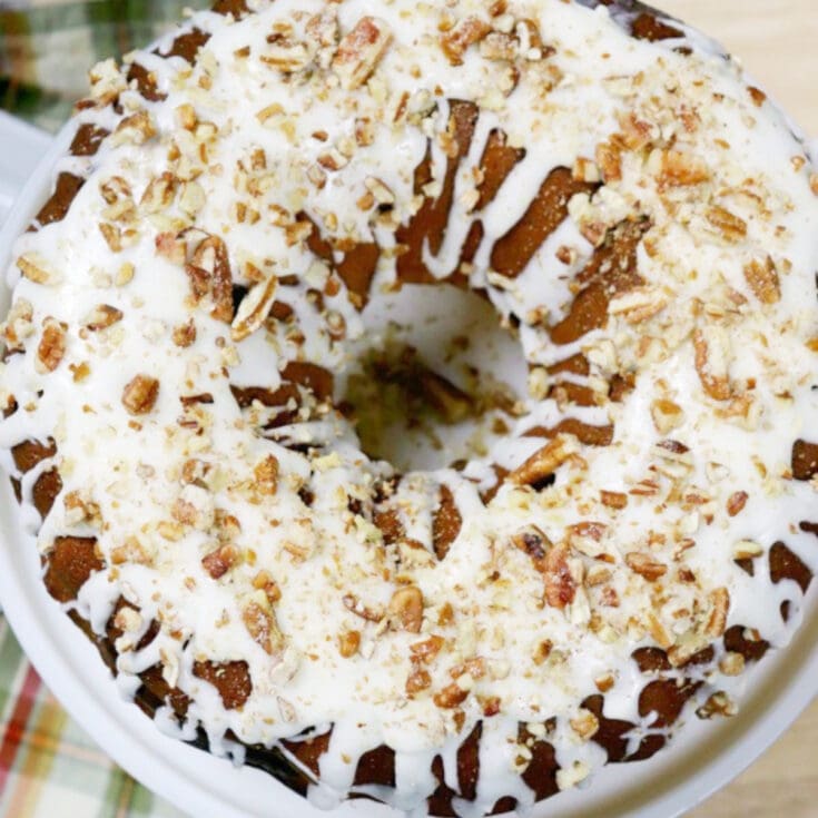 pumpkin cream cheese swirl bundt cake on a plate one of 25 esy pumpkin cake recipes