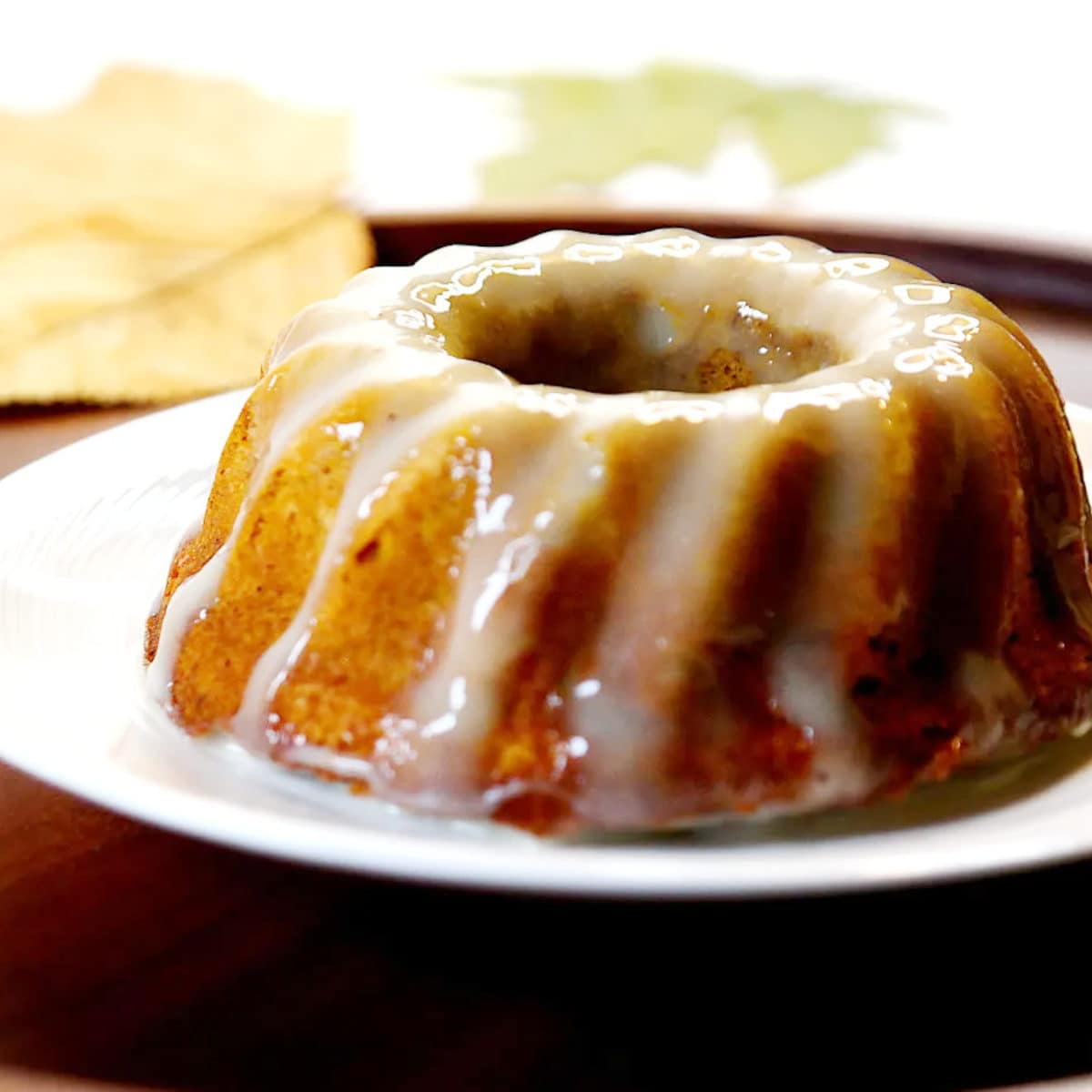 mini pumkin bundt cake on a white plate