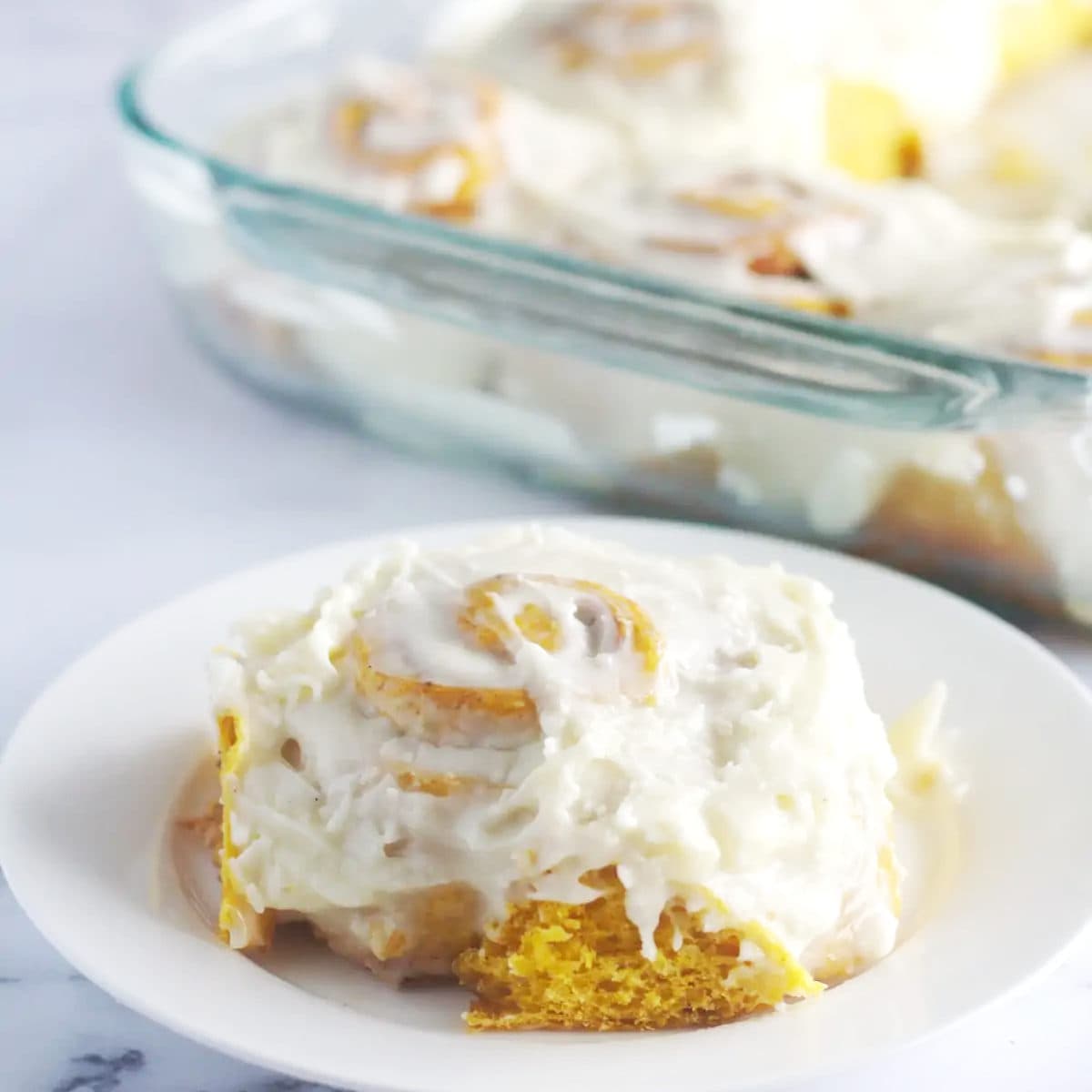 pumpkin cinnamon roll with creme cheese frosting