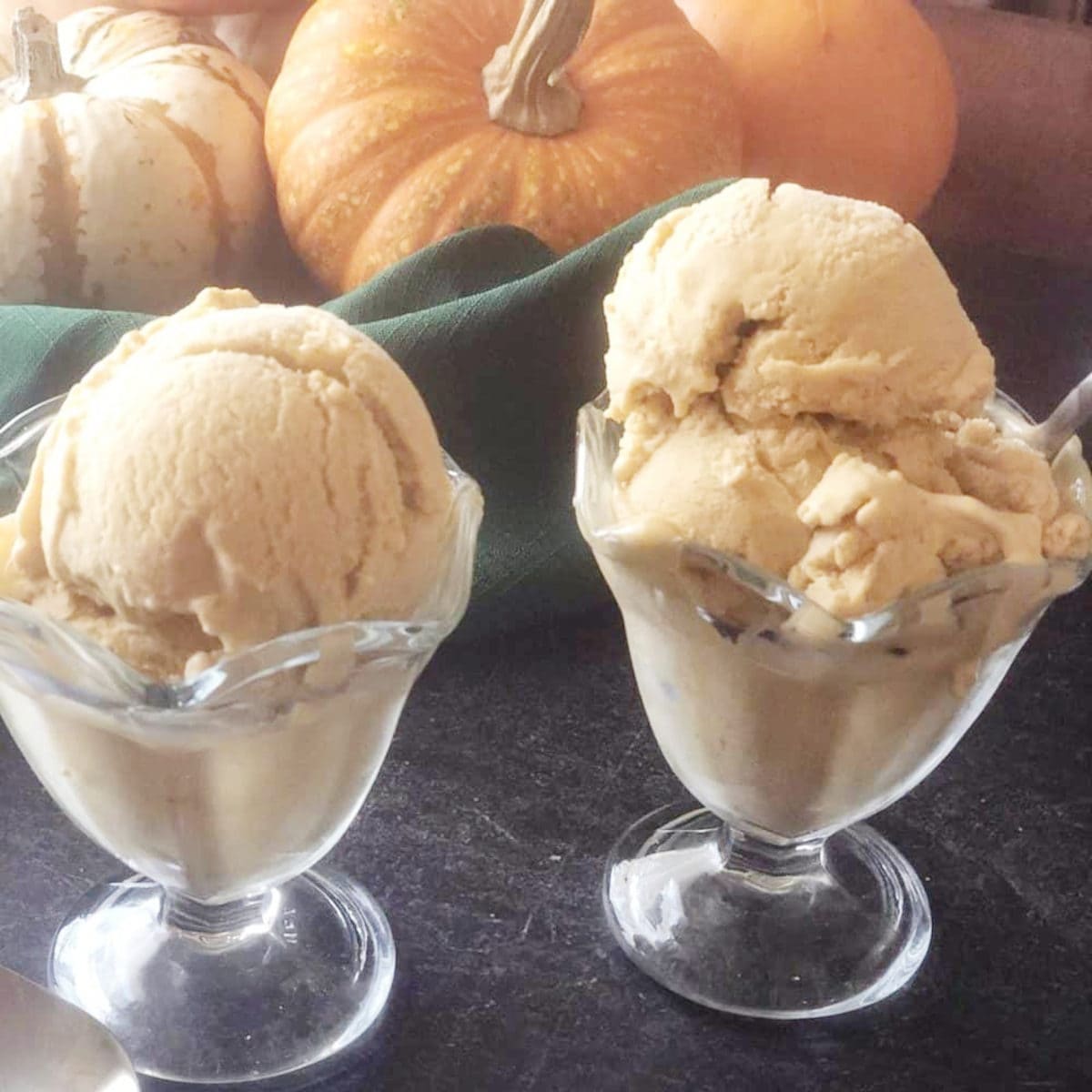 Two glass cups with scoops of Pumpkin Spice Ice Cream.