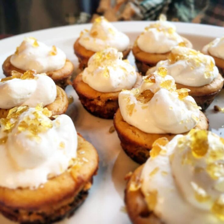 mini pumpkin cheesecake tarts on a plate